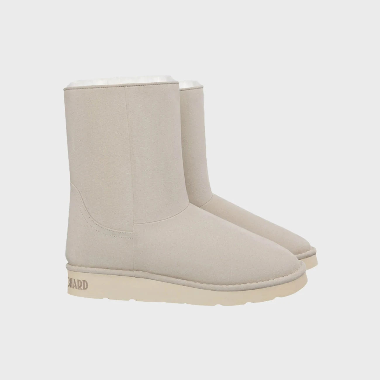 Off-white faux suede vegan boots with faux fur