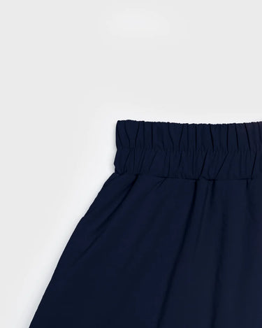 Navy blue vegan skirt with elastic waistband made from recycled materials. - The New Orchard CH