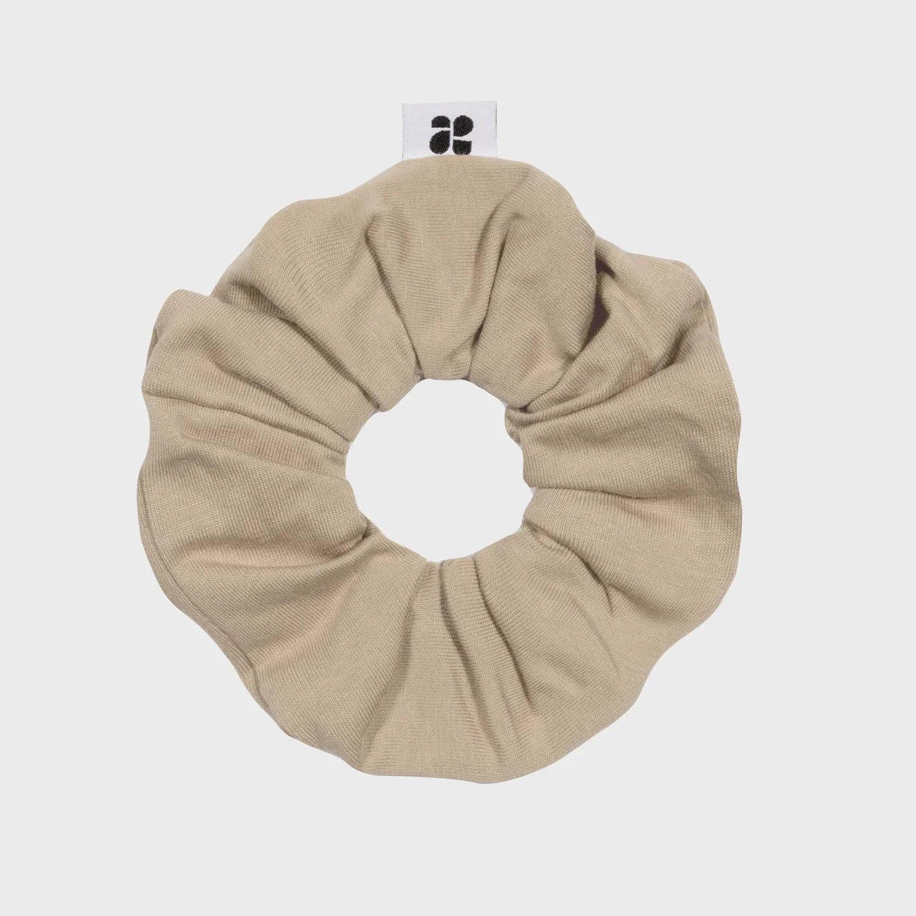 Beige recycled fabric scrunchie eco conscious fashion item
