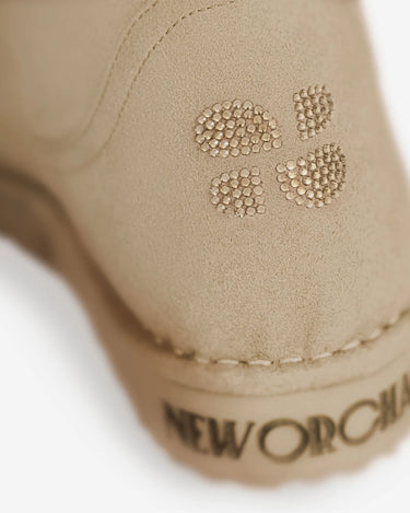 Beige vegan luxury knee-high boots with crystals
