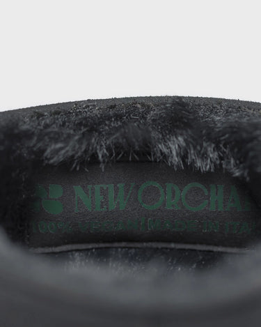Everyday black with green sole vegan boots – ugg-inspired