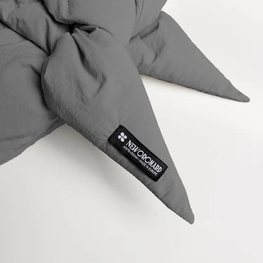 Light grey vegan winter capuche made from recycled materials with pointed ends and black branded label. - The New Orchard CH