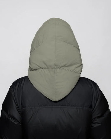 Khaki vegan hood made from recycled materials on black puffer jacket back view. - The New Orchard CH