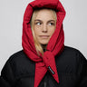 Vivid red vegan winter capuche made from recycled materials paired with black puffer jacket. - The New Orchard CH
