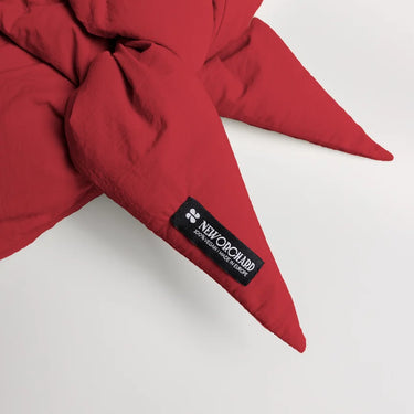 Vivid red vegan winter capuche with recycled materials and unique pointed ends. - The New Orchard CH