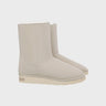 Off-white faux suede vegan boots with faux fur