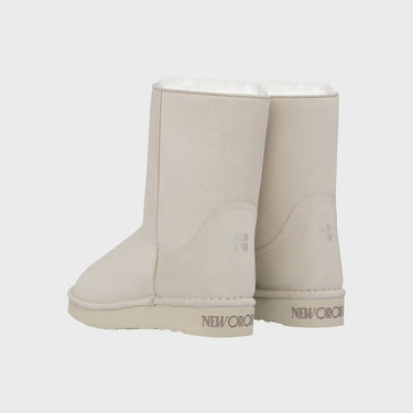 Off-white mid-length vegan boots with faux fur lining