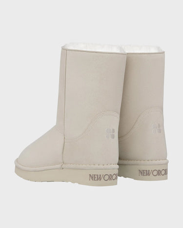 Off-white mid-length vegan boots with faux fur lining