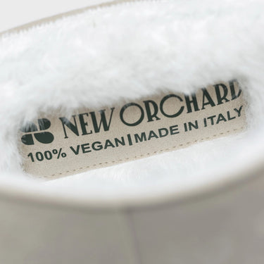 Plant-based off-white faux fur boots – cruelty-free