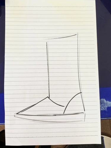 Sailboat drawing on lined paper with a blue background