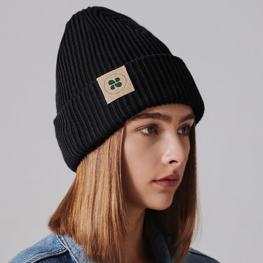Warm black knit hat for cold winter weather