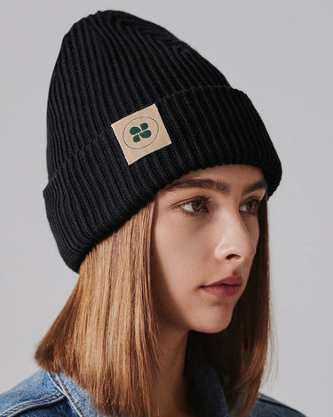 Warm black knit hat for cold winter weather